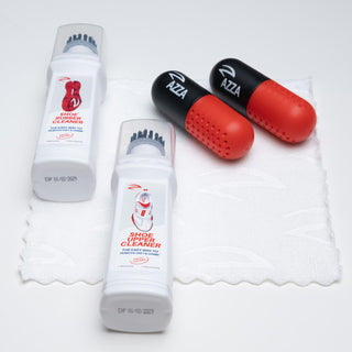 Two bottles of shoe upper cleaner and two red and black AZZA products on a white background.